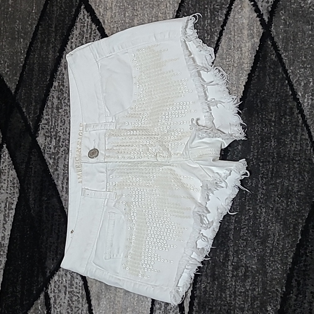 AMERICAN EAGLE OUTFITTERS WHITE SEQUINS RAW-EDGE DENIM JEAN SHORTS